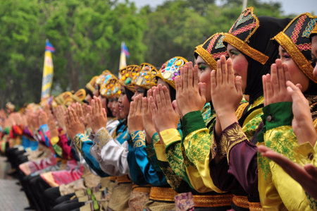 Jakarta, Indonesia - April 19, 2015 : Ratoh Jaroe Saman dancers perform in Jakarta, Indonesia. Saman Dance is a traditional dance of the Province of Nanggroe Aceh Darussalam, Indonesia.のeditorial素材