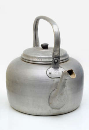 Classic alumunium teapot white background