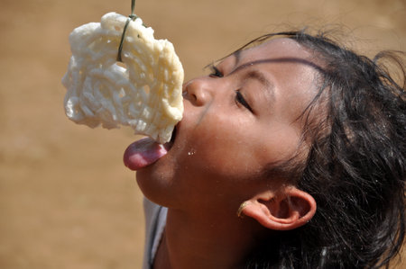 Ciamis, Indonesia - August 17, 2019: Kerupuk eating competition in Indonesia Independence Day celebrationのeditorial素材