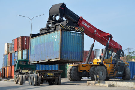 Jakarta, Indonesia - October 28, 2018: Container loading and unloading activities at Tanjung Priok Harbor, Jakarta - Indonesia.のeditorial素材