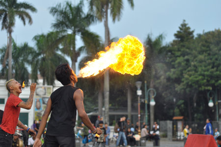 Jakarta, Indonesia - January 17, 2015: Fire game show in Fatahillah Park, Jakarta - Indonesiaのeditorial素材