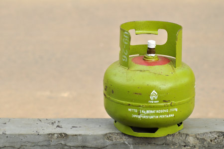 Ciamis, Indonesia - August 16, 2021 : Close up of pertamina gas cylinder 3 Kg, West Java, Indonesia. The 3 kg gas cylinder is intended for the poor in Indonesia.のeditorial素材