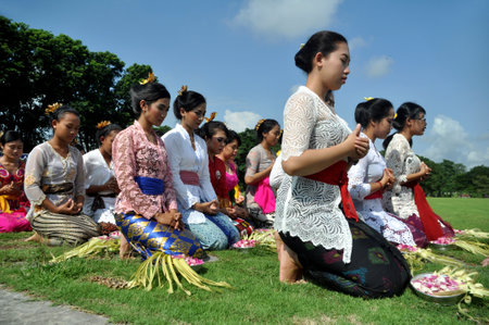 Central Java, Indonesia - March 1, 2015 : Hindus in Java are performing a prayer ritual in the courtyard of Prambanan Temple, Central Java - Indonesiaのeditorial素材