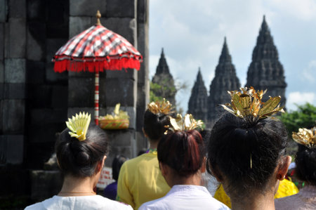 Central Java, Indonesia - March 1, 2015 : Hindus in Java are performing a prayer ritual in the courtyard of Prambanan Temple, Central Java - Indonesiaのeditorial素材