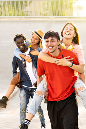 Happy multiracial friends having fun together. Soft focus. Concept of friendship with multicultural young people.の写真素材