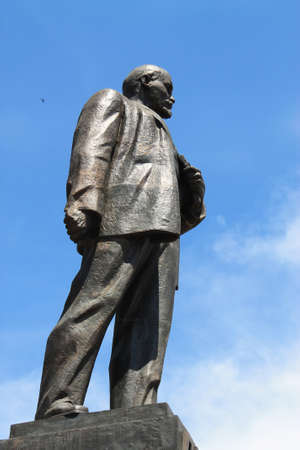Lenin monument on the background of the blue sky
