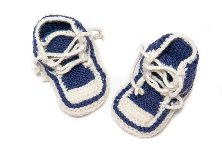 baby shoes on white backgroundの写真素材