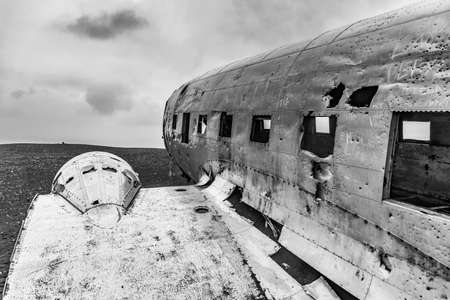Plane crash in a black beach of iceland monochromatic