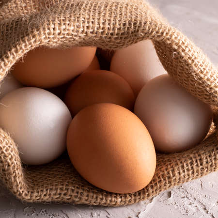 No plastic concept, Organic easter eggs in sackcloth, zero waste
