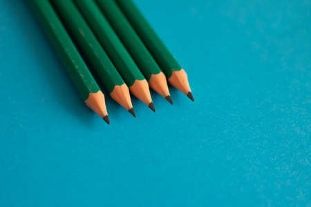 School concept with five black pencils in close up, Place for textの写真素材