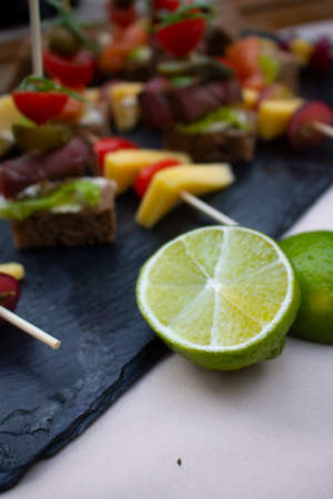 Vegan healthy snacks, no sugar breakfast. Slice lime image, soft focusの写真素材