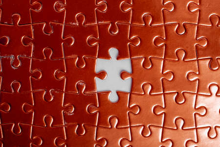 red puzzles with missing part, flat lay. Management conceptの写真素材