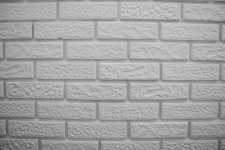 Modern brick wall, gray and white photoの写真素材