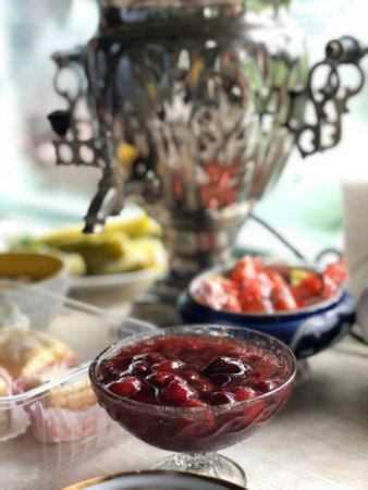 samovar with jam and fruits, vertical imageの写真素材