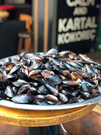 Many mussels in big bowl, soft focus backgroundのeditorial素材