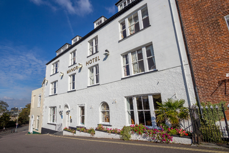 EXMOUTH, UK, 21 October 2016: The three-story white building - Manor Hotel. Devon. UKのeditorial素材