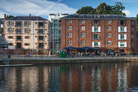 EXETER, UK, 12 July 2016: buildings and outdoor cafes on the Exeter Quay. Devon.のeditorial素材