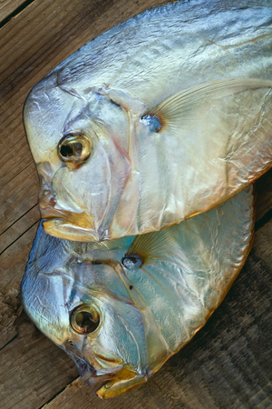 two Vomero closeup. Cold smoked. On a wooden backgroundの写真素材