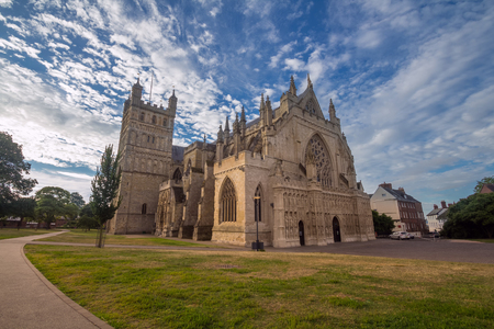 Cathedral in Exeter. Early morning. Low sunlight. Blue sky with cirrus clouds. Nobody. Devon. UKの写真素材