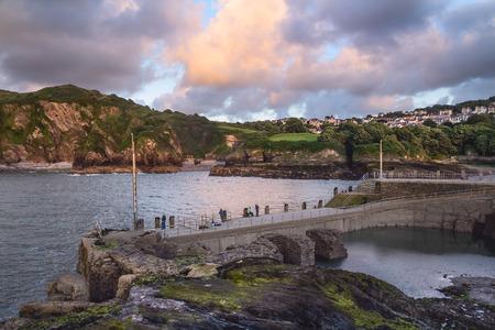 The harbor in Ilfracombe. Fishermen catch fish. Evening. North Devon Coast. UKの写真素材