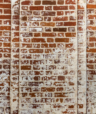 fragment of the old wall of red brickの写真素材