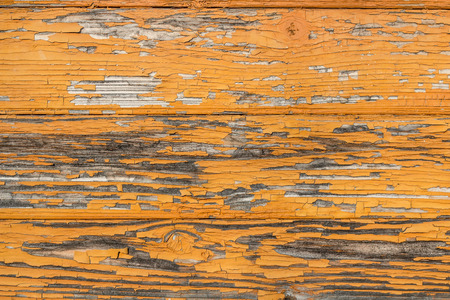 surface texture of the boards with the old orange paintの写真素材