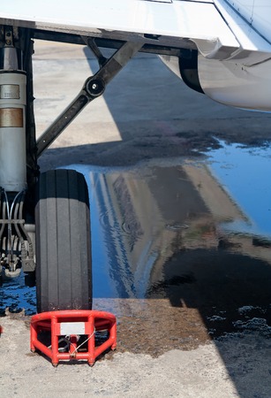 Aircraft landing gear in the parking lotの写真素材