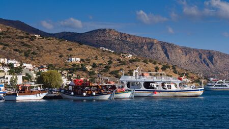 Ship moored off the coast of Elounda. Mirabello Bay. Crete, Greeceの写真素材