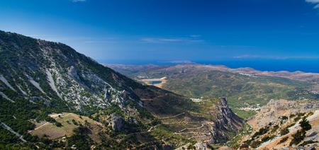 Mountains of the island of Crete and winding road. The view from the passの写真素材