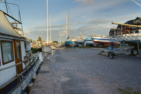 Sailing ships and boats moored in the harbor on the Exe channel. Exeter. Devon. Englandの写真素材