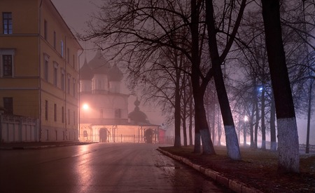 Ancient stone church in the center of the city at night in the fog. Yaroslavl, Russiaの写真素材