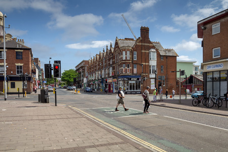 Exeter, Devon, England, 20 July, 2016: Crossroads in the city center of Exeter. Pedestrians cross the roadのeditorial素材