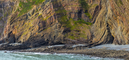 Geological outcrops on the coast of Hartland Quay. Natural background. Devon. Englandの写真素材