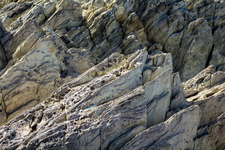 Fragment of a rocky shore. Natural background. Woolacombe, Devon, England.の写真素材