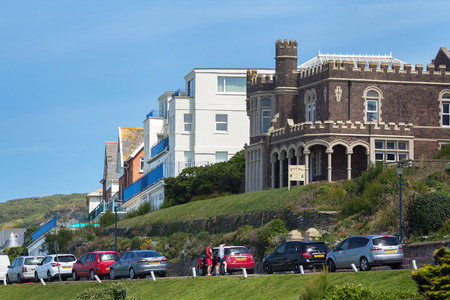 Woolacombe, Devon, England, 14 July, 2016: Hotels by the sea near the popular beach of Woolacombe. Cars are parked nearby. Devon. Englandのeditorial素材