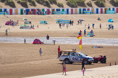 Woolacombe, Devon, England, 14 July, 2016:  Beach Woolacombe with vacationers. Coast Guard Vehicleのeditorial素材