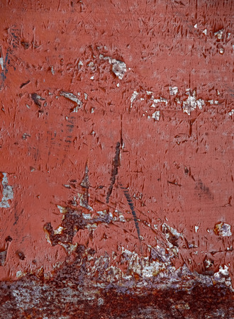 Metal surface. Painted in brown. It looks shabby and old. There are a lot of scratches and peeling paint.の写真素材