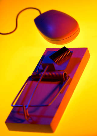 MOUSE TRAP WITH COMPUTER CHIP AS BAIT ATTRACTING COMPUTER MOUSE