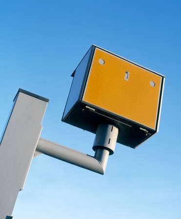 GATSO ROAD TRAFFIC SPEED CAMERA AGAINST BLUE BACKGROUND