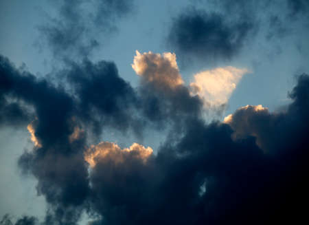 SUNLIGHT BREAKING THROUGH CLOUDS AFTER STORMの写真素材
