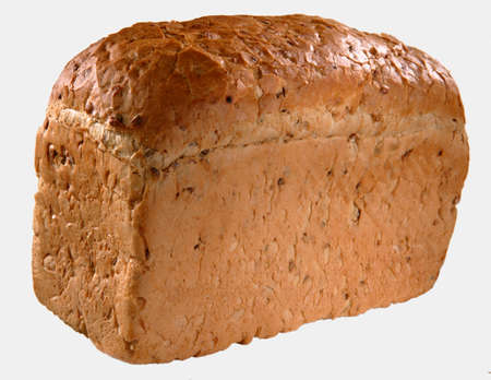 FRESHLY BAKED LOAF OF BREAD ISOLATED ON WHITE BACKGROUNDの写真素材