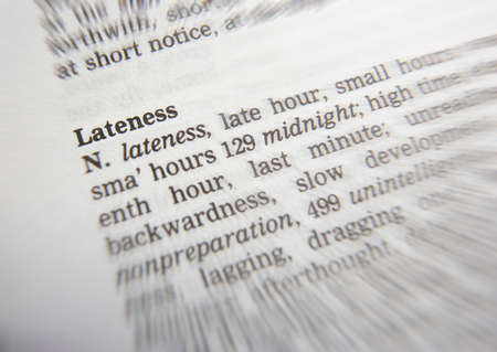 Close up of thesaurus page showing definition of the word latenessの写真素材