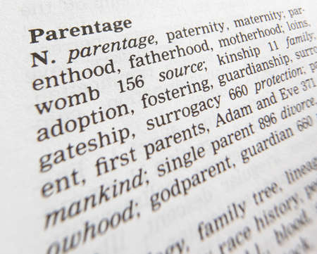 Close up of thesaurus page showing definition of the word parentage