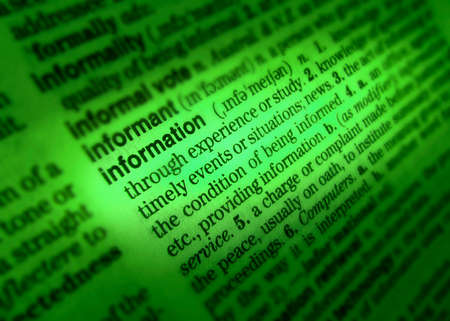Close up of dictionary page showing definition of the word informationの写真素材