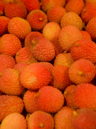 Lychees on supermarket shelf in close up