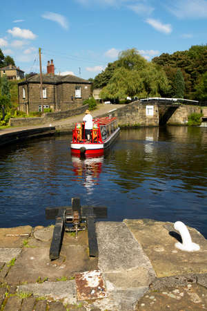 Canal barge at Salterhebble Lock in Yorkshire, Englandのeditorial素材