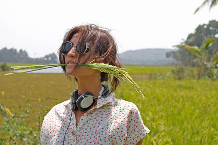 Young woman in a fieldの写真素材