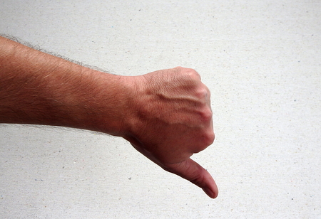 Thumbs down on a white background,