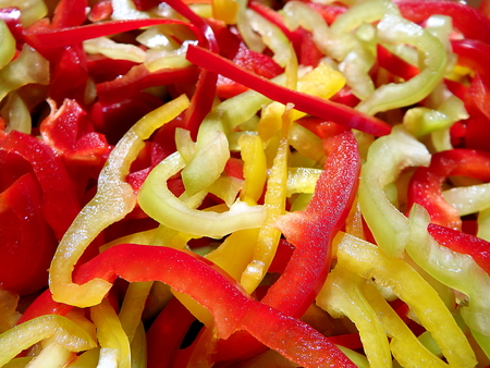 Background of fresh sliced peppersの写真素材
