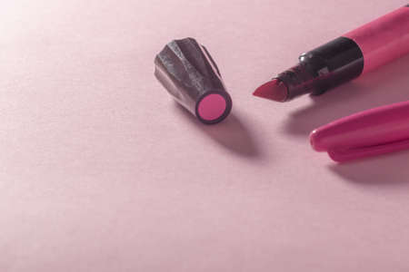markers and pink paint on pink backgroundの写真素材
